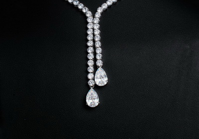 18к. (750°) white gold with diamonds.  Prices depend on the size and quality of the diamonds of your choice